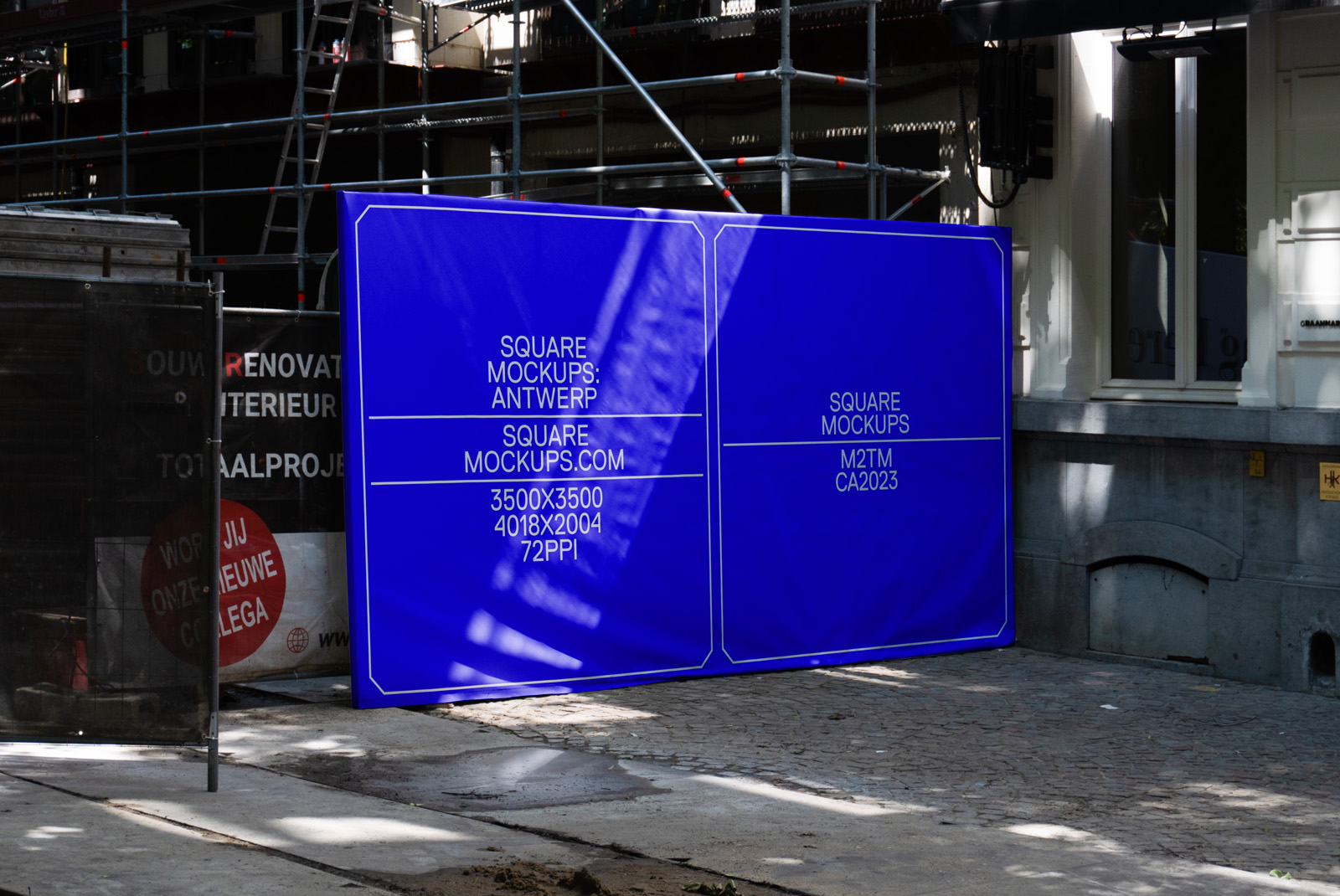 Blue square billboard mockup on urban street with construction scaffolding, realistic outdoor advertising design presentation, high-resolution, clear sunny day.